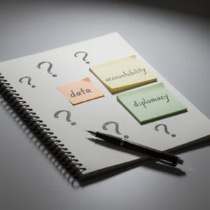 An overhead photo shows an open notebook with sticky notes labeled “data,” “accountability,” and “diplomacy,” symbolizing ongoing global health questions.